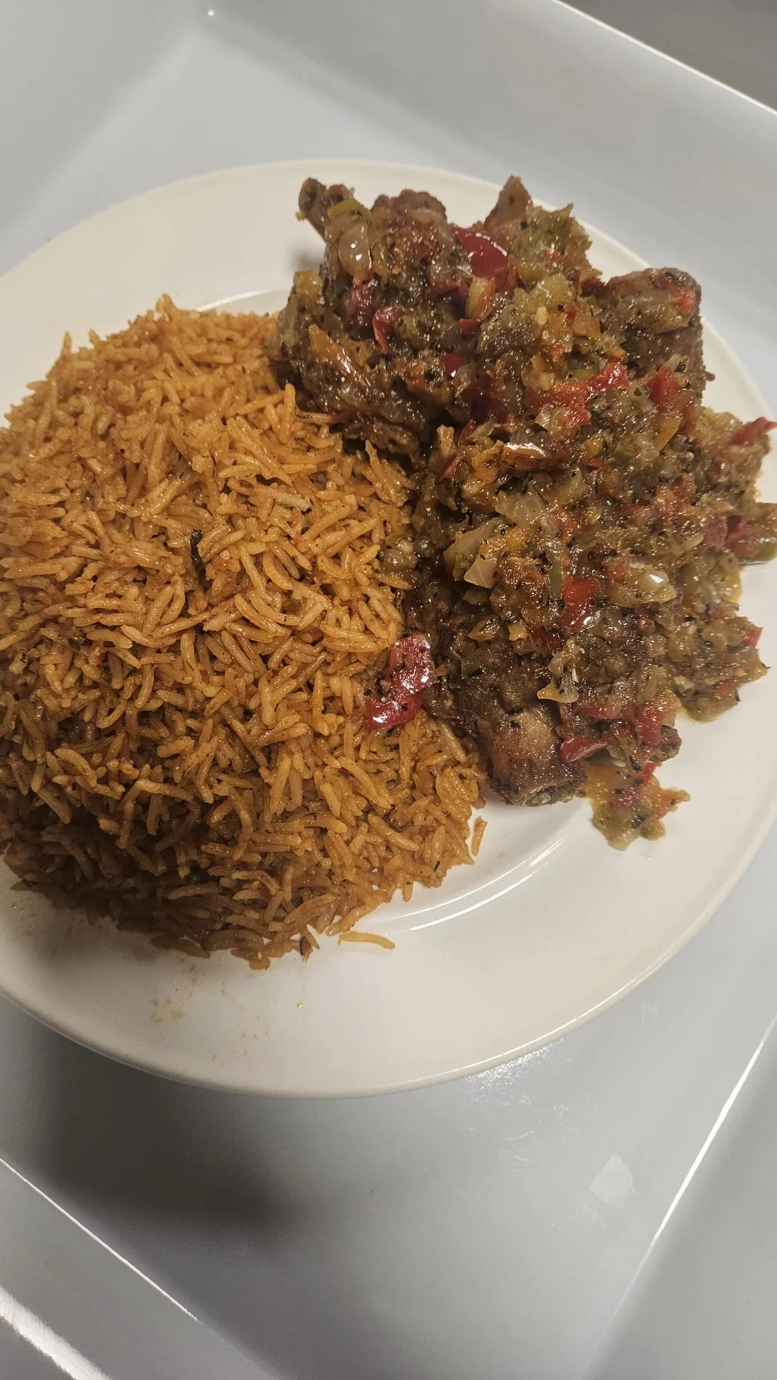 Delicious Spicy Goat Rice at Lochi Afro Nija Nigerian Restaurant in Edmonton, AB